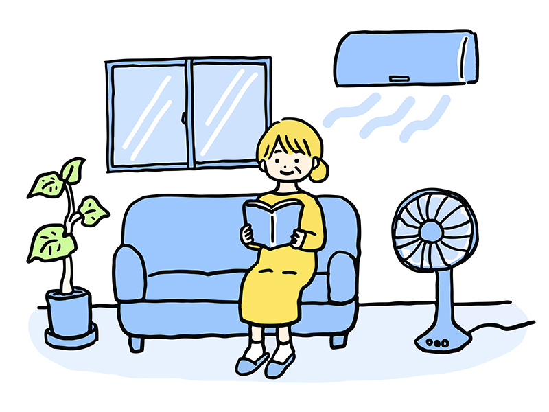涼しい室内でくつろぐ女性